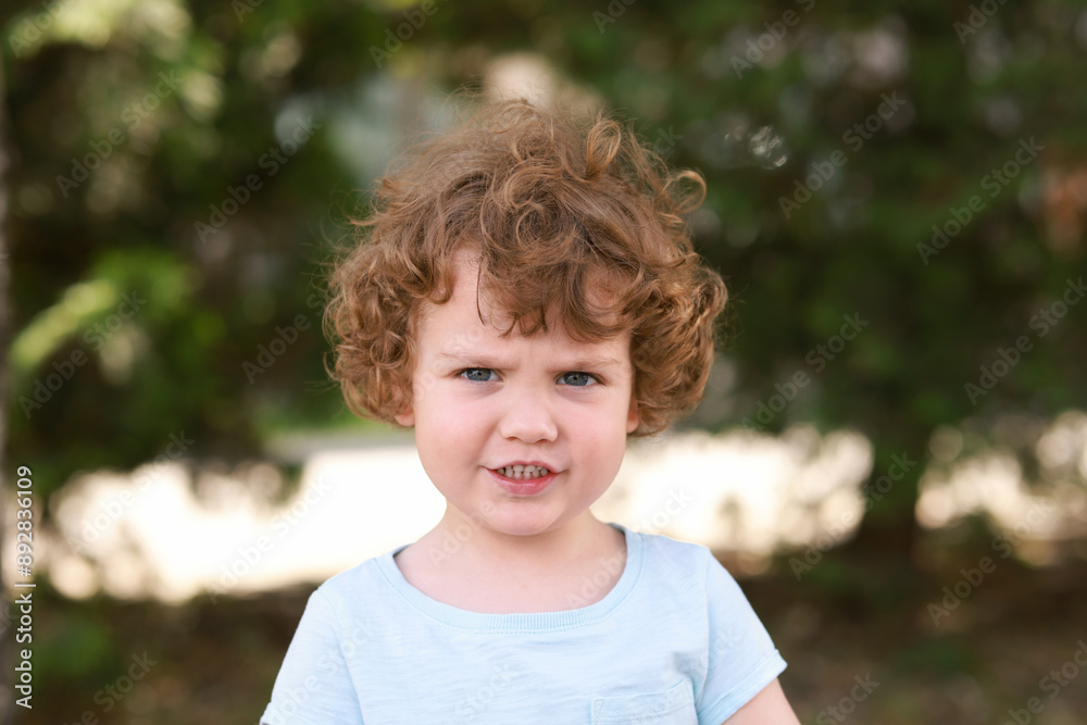 Portrait of little boy outdoors. Cute child Portrait of little boy outdoors. Cute child