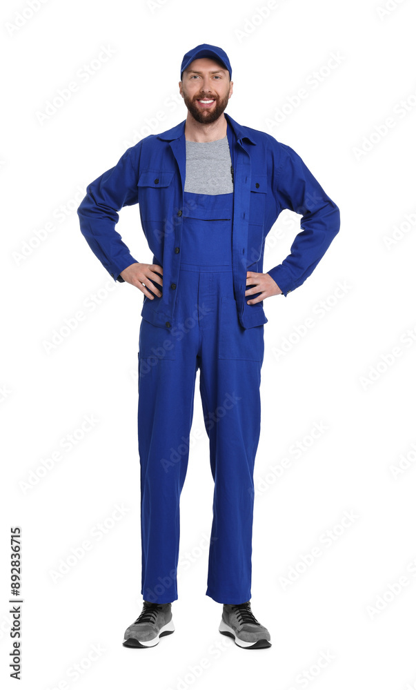 Professional auto mechanic in blue uniform on white background Professional auto mechanic in blue uniform on white background