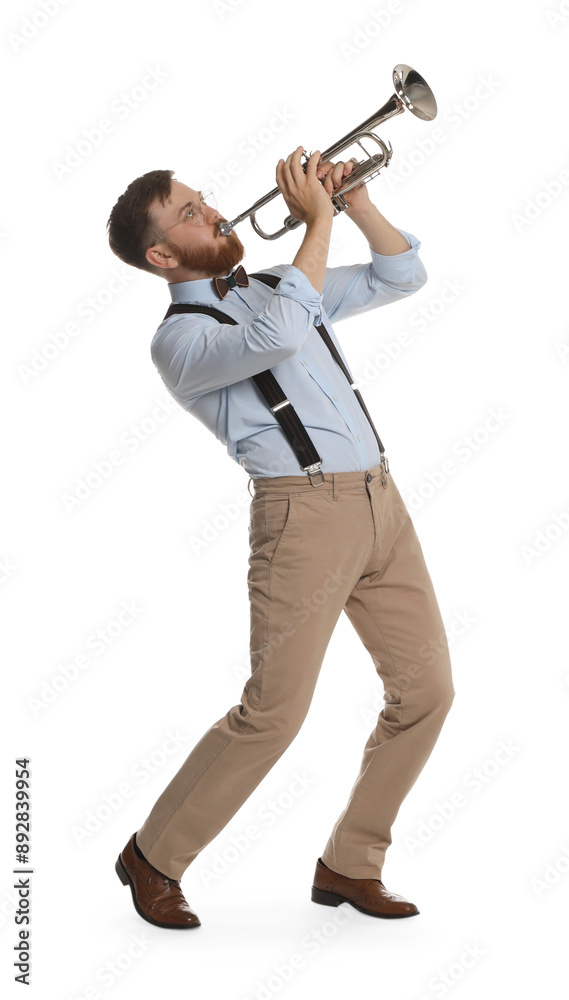Naklejka premium Handsome musician playing trumpet on white background