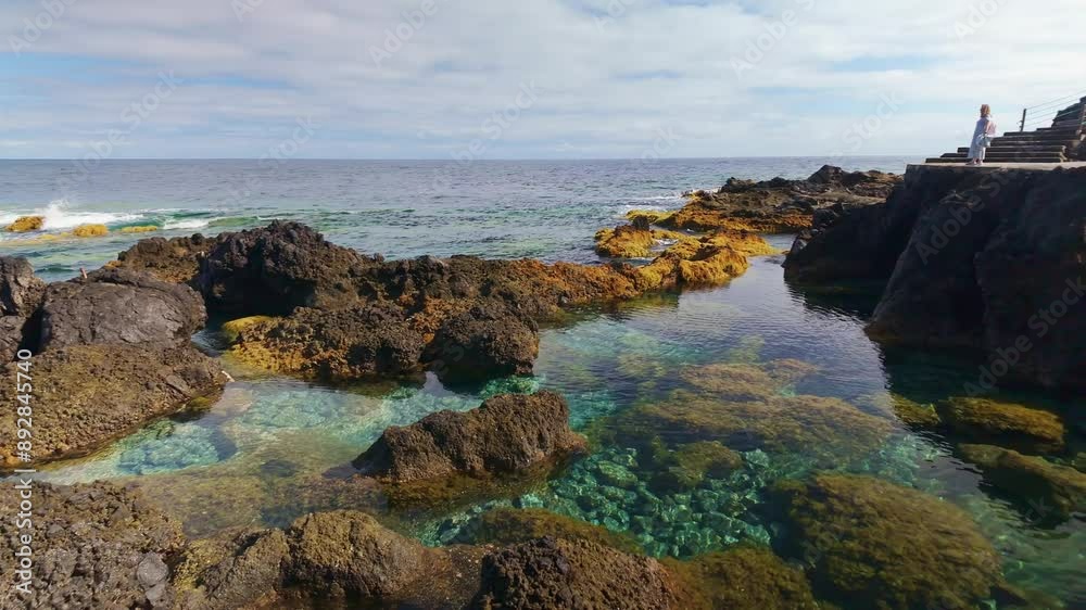 Natural swimming pools on the edge of the sea in the town of La Fajana north of La Palma, Canary Islands. Natural swimming pools on the edge of the sea in the town of La Fajana north of La Palma, Canary Islands.