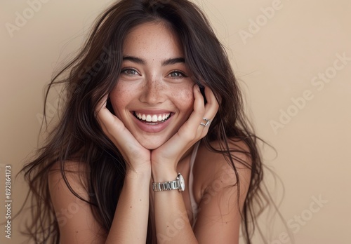 Woman Smiling With Hands on Chin