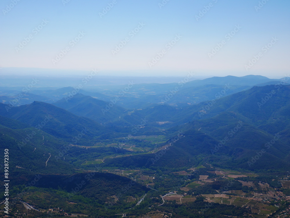 Panorama of a green mountain under cloudy skies in the south of France Panorama of a green mountain under cloudy skies in the south of France