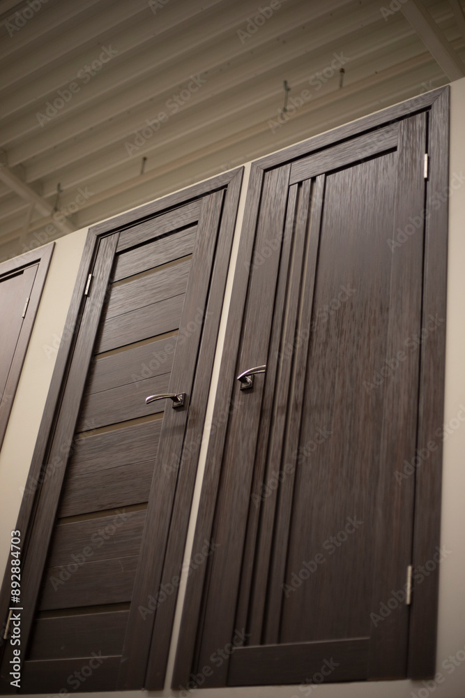 Obraz premium Sale of doors. Wooden door to the room. Interior details.