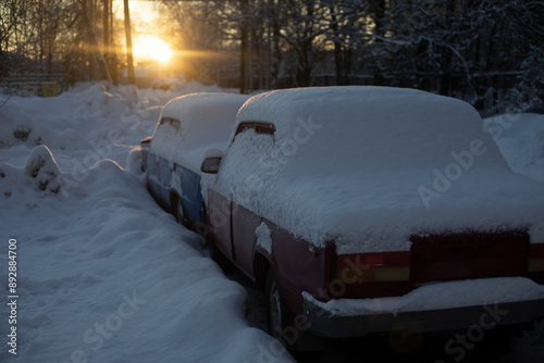 The car is in trouble. Transport in winter. Parking in a snowstorm. photo