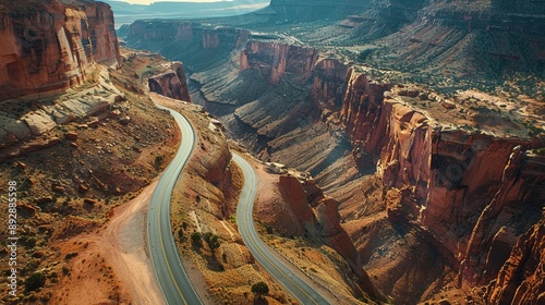 Highway through canyon, steep cliffs, winding road, dramatic landscape
