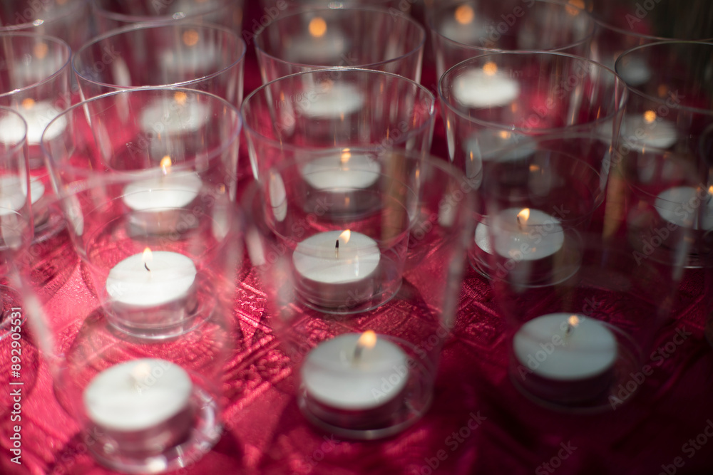 Candles of remembrance. Candles at funeral event. Lot of candles stand in row. Candles of remembrance. Candles at funeral event. Lot of candles stand in row.