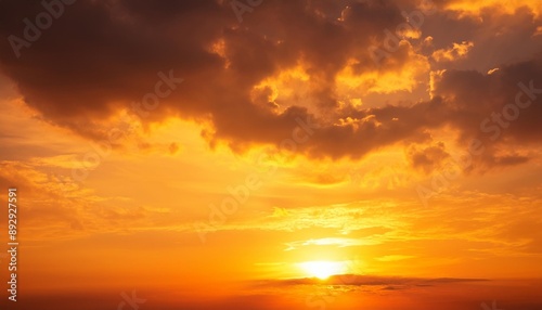 orange sunset sky in the evening on gold hour sky background