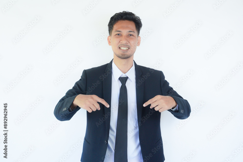 Asian businessman smiling confident with both hands pointing below