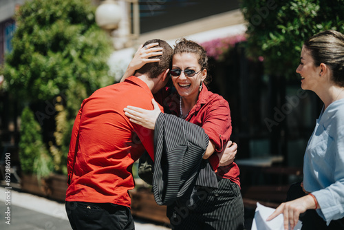 Fotografi A group of business colleagues embrace and share a joyous moment together outdoors
