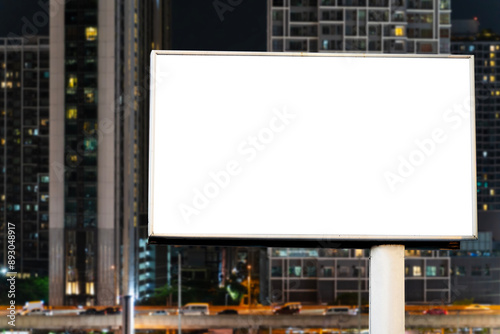 Photography Blank white road billboard with Bangkok cityscape background at night time