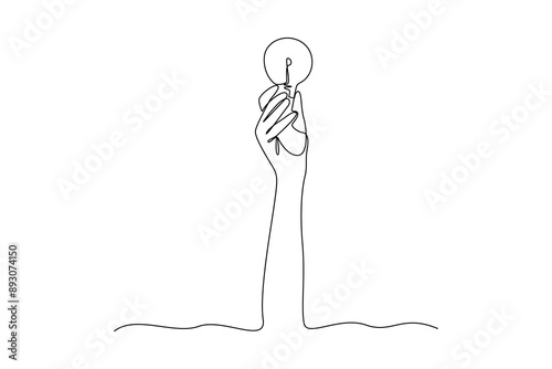 continues line of hand holding light bulb for idea inspiration. one line art illustration