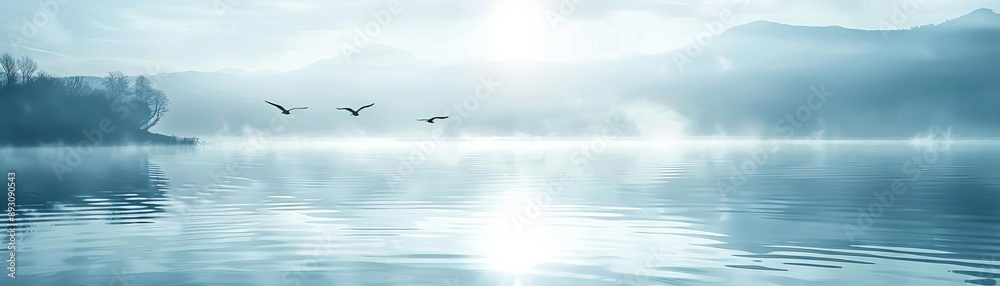 Birds flying over a tranquil lake close up, focus on, copy space Soft blue tones Double exposure silhouette with birds and water Birds flying over a tranquil lake close up, focus on, copy space Soft blue tones Double exposure silhouette with birds and water