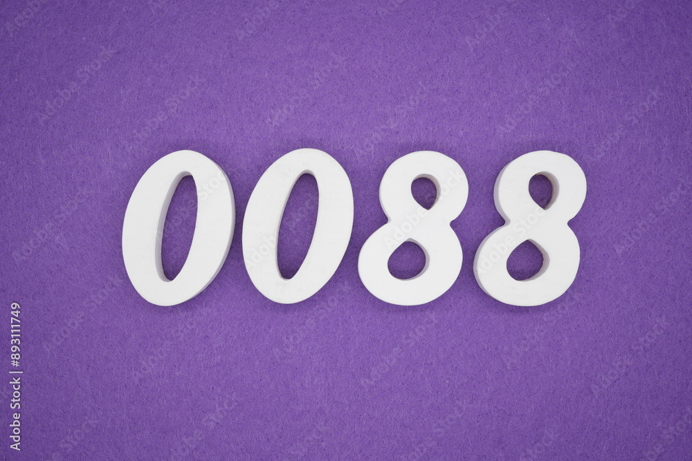 The numbers are made of white paint wood, placed on the background as a purple paper. The numbers are made of white paint wood, placed on the background as a purple paper.