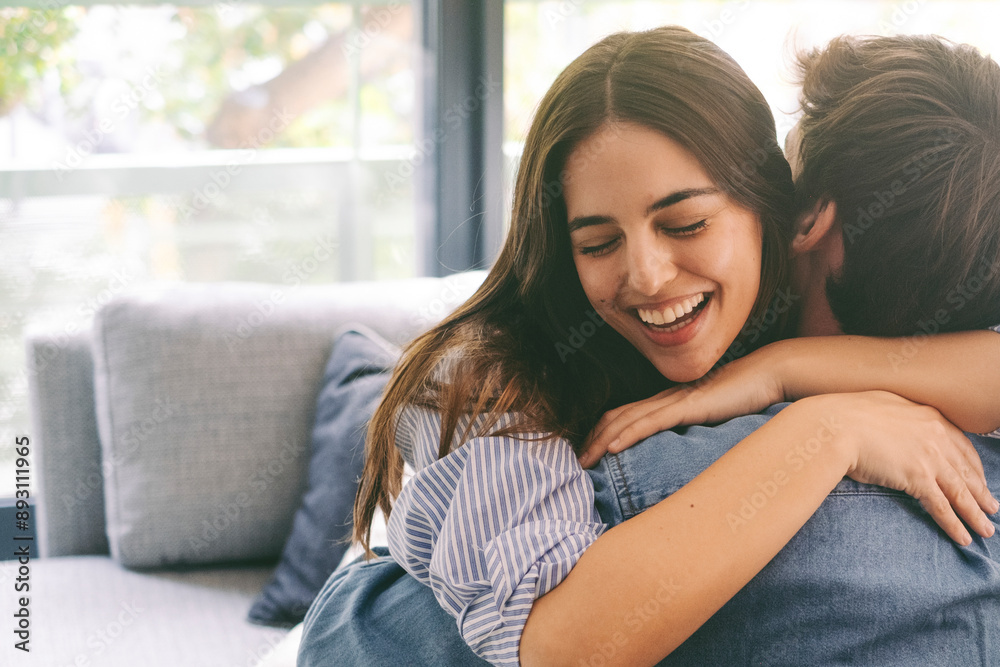 Excited couple hugging each other at home in happy moment indoor. Love and relationship concept. Friendship and celebration. Meet after long time emotion parents brothers sisters Excited couple hugging each other at home in happy moment indoor. Love and relationship concept. Friendship and celebration. Meet after long time emotion parents brothers sisters