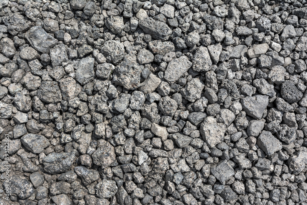 Large pieces of metallurgical slag form a natural backdrop. The texture of the slag waste is Large pieces of metallurgical slag form a natural backdrop. The texture of the slag waste is