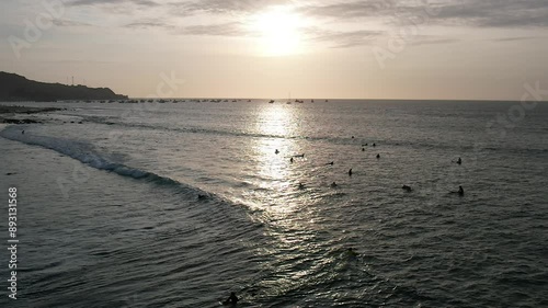 Aerial video above the coastline in the coastal town of Mancora Peru photo