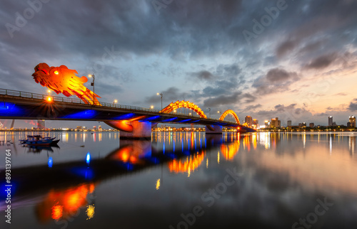 Dragon bridge in Danang at sunset which is a very famous destination for tourists