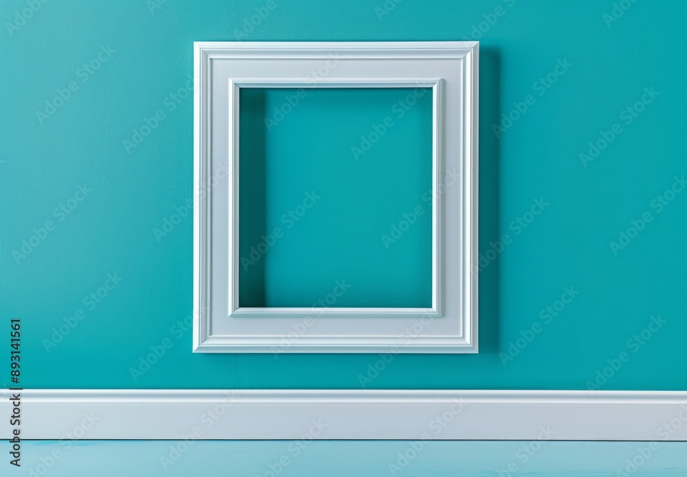 White picture frame on turquoise wall. White picture frame on turquoise wall.