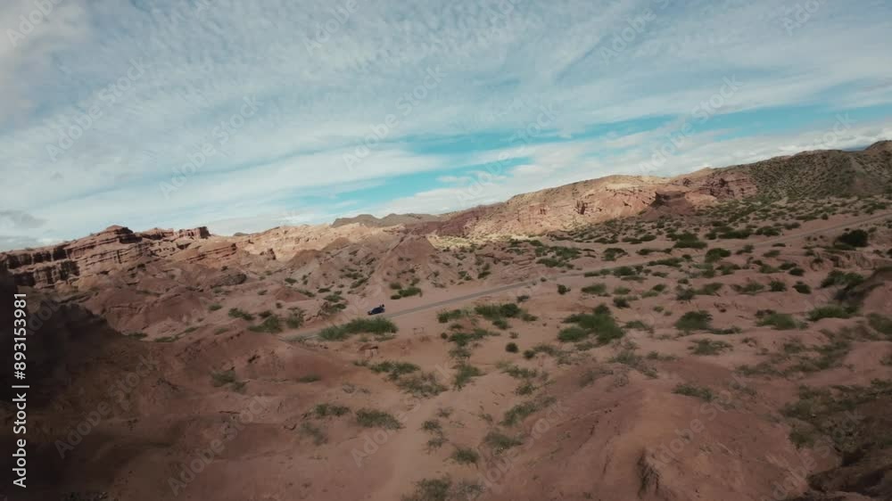 FPV drone passes through arch formation in rock. Las Ventanas. Quebrada las Conchas. Cafayate. Argentina. FPV drone passes through arch formation in rock. Las Ventanas. Quebrada las Conchas. Cafayate. Argentina.