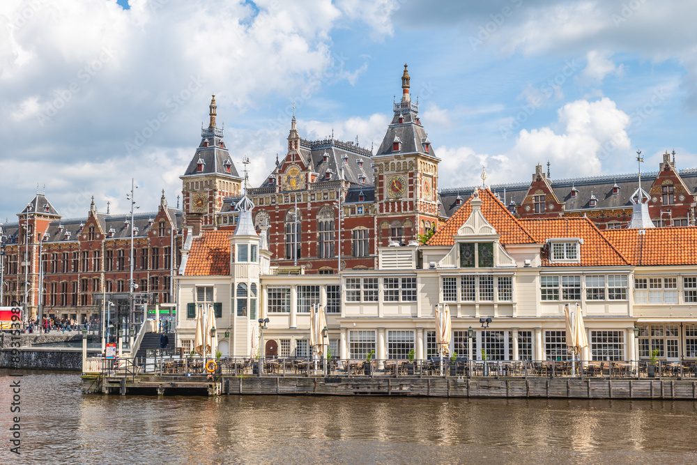 Obraz premium Amsterdam Centraal station, the largest railway station in Amsterdam, North Holland, the Netherlands