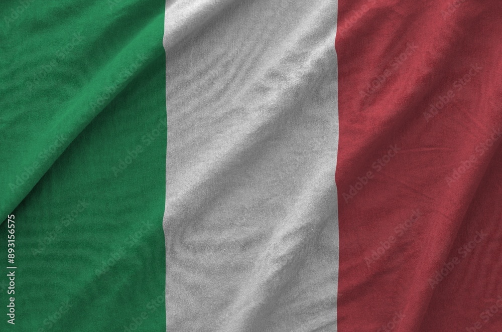 Italy flag depicted on folded wavy fabric of old cloth close up Italy flag depicted on folded wavy fabric of old cloth close up