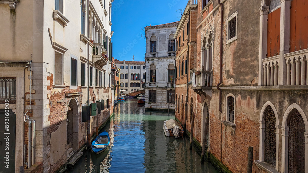 Charming Canal View in Venice with Historic Buildings Charming Canal View in Venice with Historic Buildings