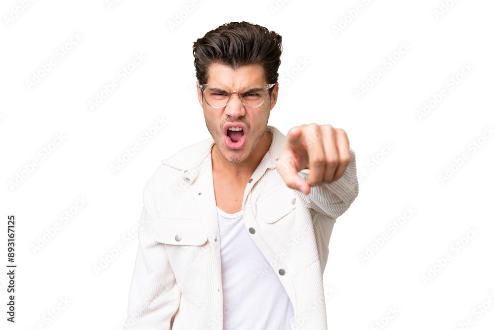 Young handsome caucasian man over isolated background frustrated and pointing to the front Young handsome caucasian man over isolated background frustrated and pointing to the front