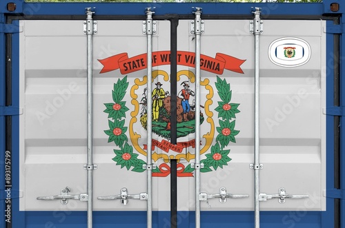 West Virginia US state flag depicted on metal doors of shipping cargo container outdoors in docks area close up photo