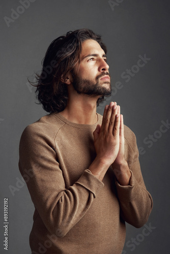 Canvastavla Belief, praying and religion with spiritual man in studio on dark background for faith in God or Jesus
