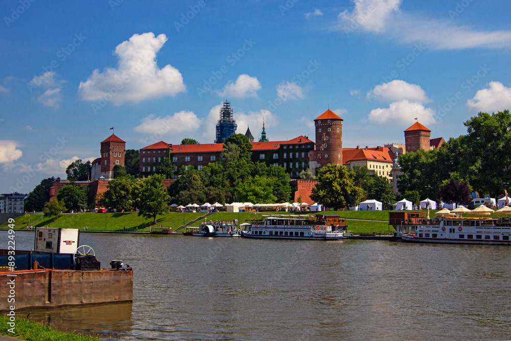Obraz premium Royal Wawel Castle and Gothic Cathedral with Renaissance Sigismund Chapel, Sandomierska and Senatorska towers, walls, yard and park. The Wawel Castle located on bank of Vistula river in Krakow, Poland