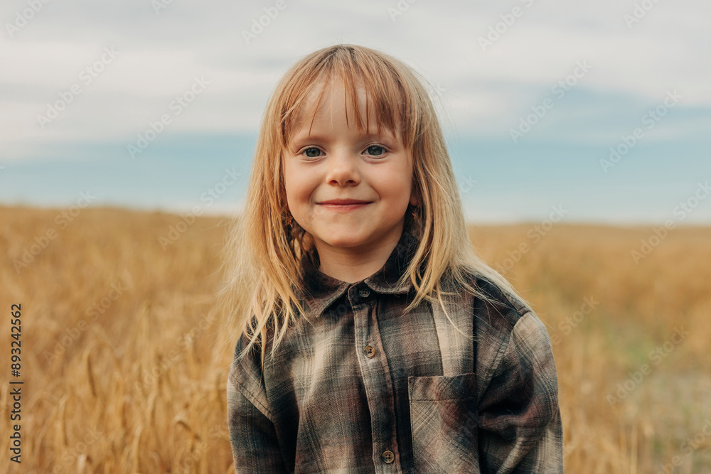 Cute smiling girl with bangs in wheat field Cute smiling girl with bangs in wheat field