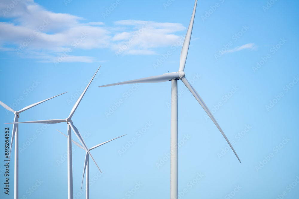 Wind energy. Wind power. Sustainable, renewable energy. Wind turbines generate electricity. Wind farm. Sustainable resources. Sustainable development. Green technology for energy sustainability. Wind energy. Wind power. Sustainable, renewable energy. Wind turbines generate electricity. Wind farm. Sustainable resources. Sustainable development. Green technology for energy sustainability.
