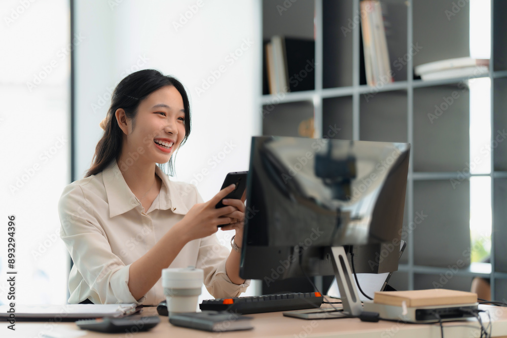 Business women celebrating job successful, reading good news on laptop, happy and excited gesture Business women celebrating job successful, reading good news on laptop, happy and excited gesture