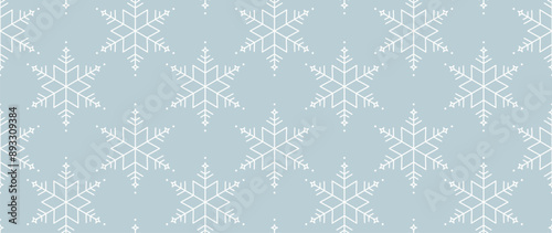 Elegant winter snowflake background vector illustration. Decorative snowflake and snowfall on light blue background. Design suitable for invitation card, greeting, wallpaper, poster, banner.