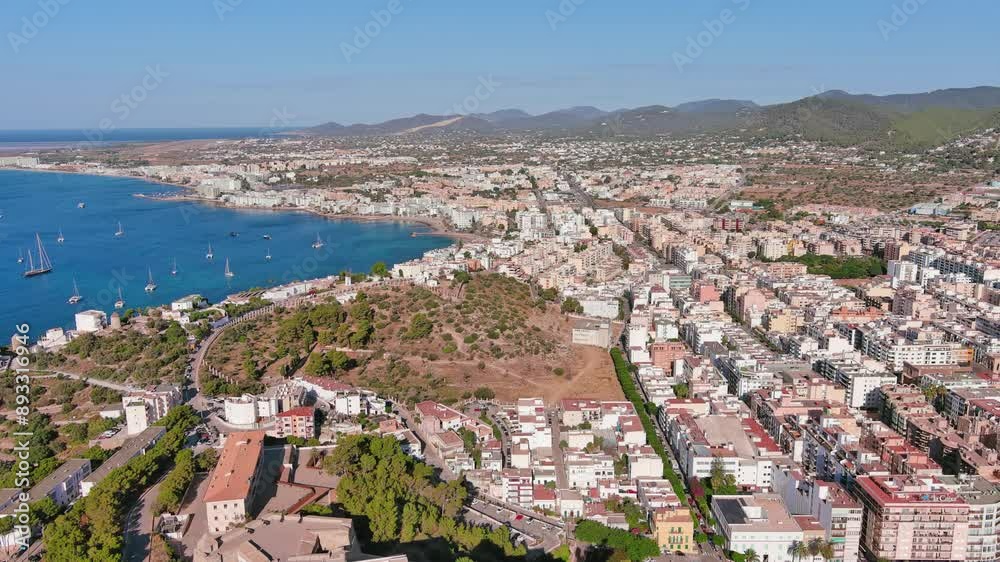 Ibiza Town, Spain: Aerial view of capital city of Ibiza island, summer day with clear blue sky - landscape panorama of Europe from above
Ibiza Town, Spain: Aerial view of capital city of Ibiza island, summer day with clear blue sky - landscape panorama of Europe from above