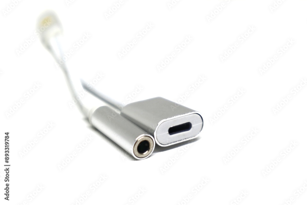 Lightning to 3.5mm Adapter hole isolated on white Lightning to 3.5mm Adapter hole isolated on white