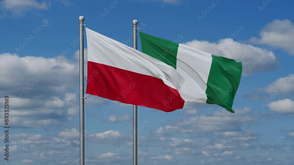 Nigeria and Poland flags flying together, video concept of the relationship, two country relations concept Nigeria and Poland flags flying together, video concept of the relationship, two country relations concept