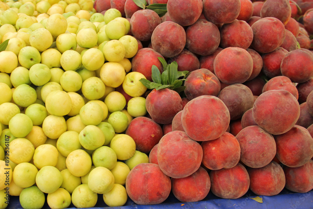 Yellow nectarine fruit and peach fruit at Farmer's Market Yellow nectarine fruit and peach fruit at Farmer's Market