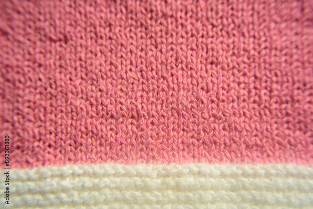 Detalle de tejido de lana rosa y blanco Detalle de tejido de lana rosa y blanco