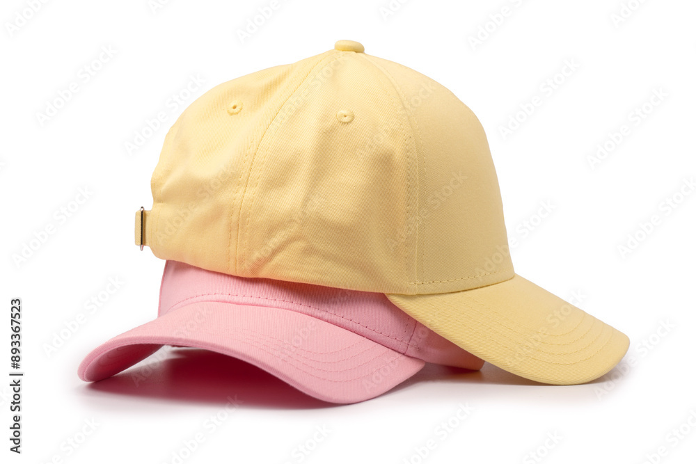 Pink and yellow cap isolated on white background. Pink and yellow cap isolated on white background.