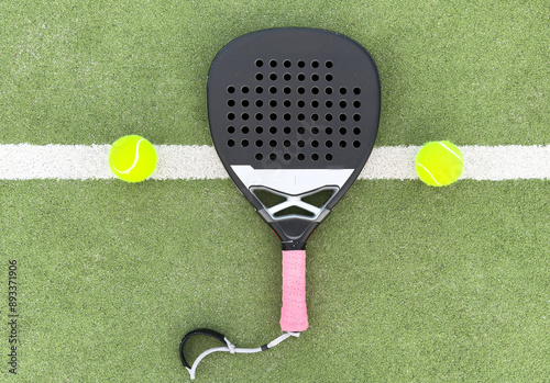 Foto Paddle tennis objects on grass court
