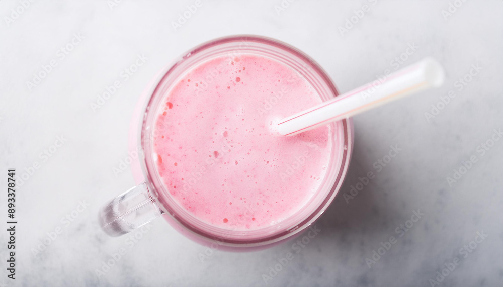 Pink smoothie on white stone table. Healthy, tasty beverage. Fruit milk shake. Organic detox drink Pink smoothie on white stone table. Healthy, tasty beverage. Fruit milk shake. Organic detox drink