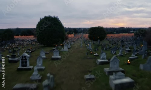 halloween pumpkins in the cemetery 4K hyperrealistic video First person view shot of a [subject]. hyper-speed fly, dynamic motion, dynamic blur, timelapse, 30x speed, cinematic, muted color palette. photo