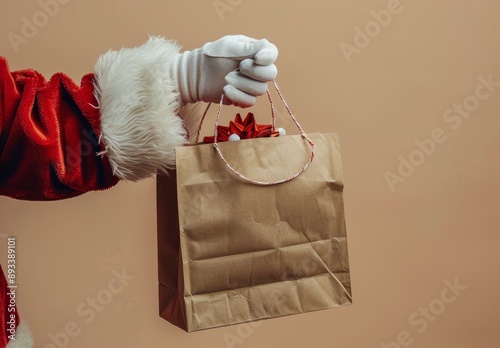 Santa Claus Holding Gift Bag