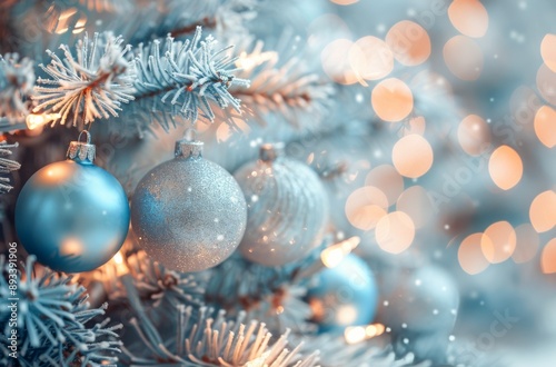 Blue Ornaments on a Snowy Christmas Tree