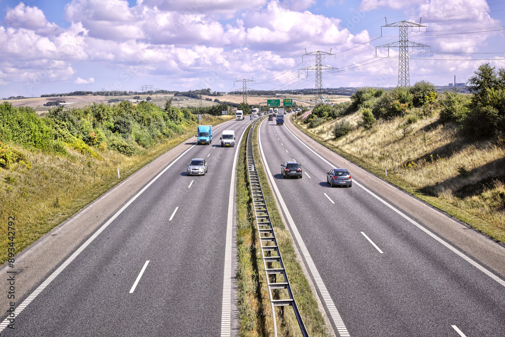 Cars, highway and transportation with driving for journey, movement and travel on freeway for road trip. Outdoor, vehicle and moving fast on motorway, urban commute and expressway or direction.