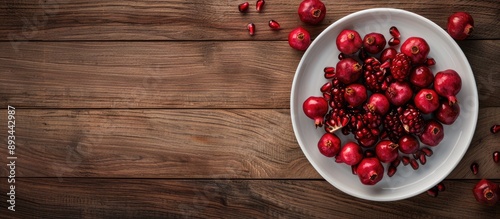 Pomegranate seeds on a plat...