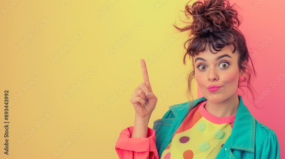 Portrait of a young woman pointing her fingers isolated on a pastel background. Portrait of a young woman pointing her fingers isolated on a pastel background.