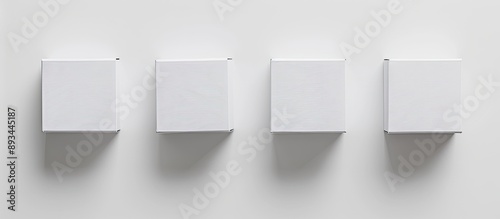 Four white packaging boxes ...