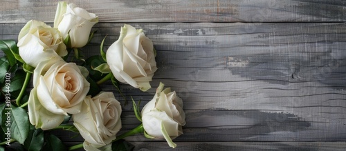White roses displayed on a ...